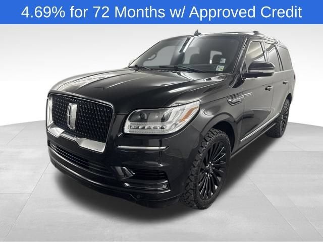 2021 Lincoln Navigator Reserve in Black — front three-quarter view